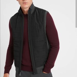 Black quilted mixed media vest